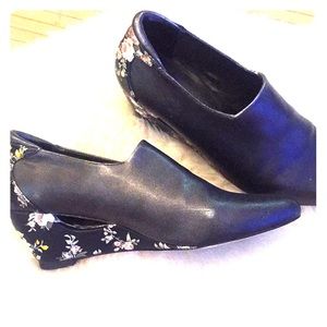 Farylrobin booties with floral pattern on heels.